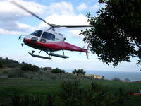 Helicopter takes off for Etna.JPG